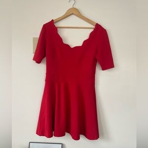 Red dress with scalloped neckline